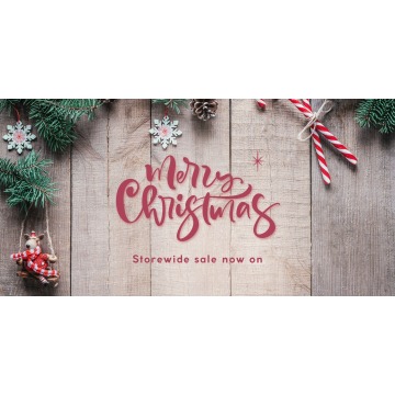 'Merry Christmas, storewide sale now on' on a wooden background'